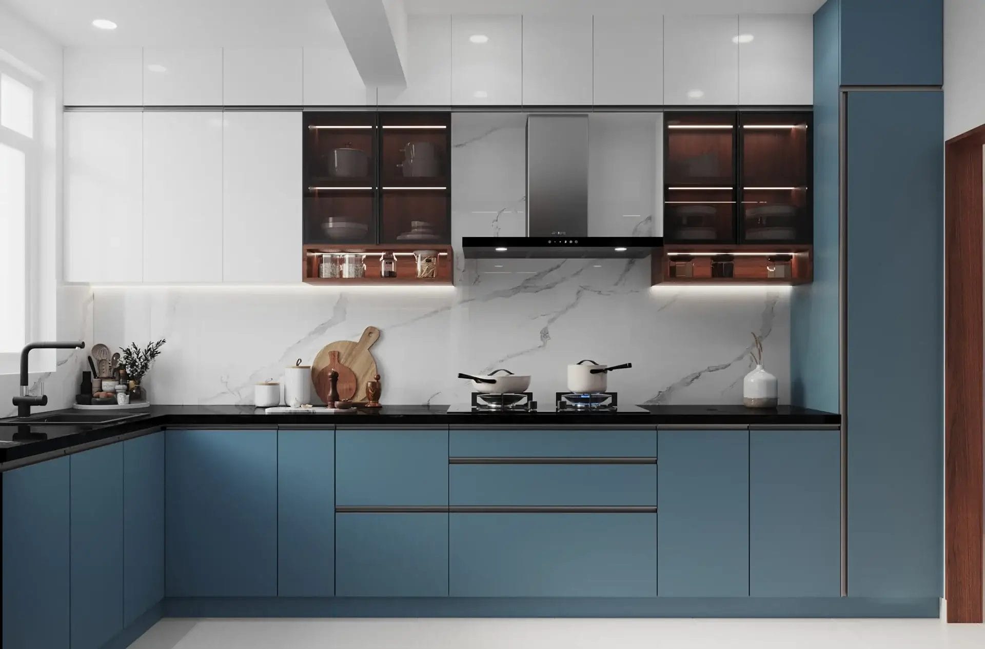 A modern kitchen Interior Design in a Blue Colour Scheme in Bangalore by Interiosplash interior design company